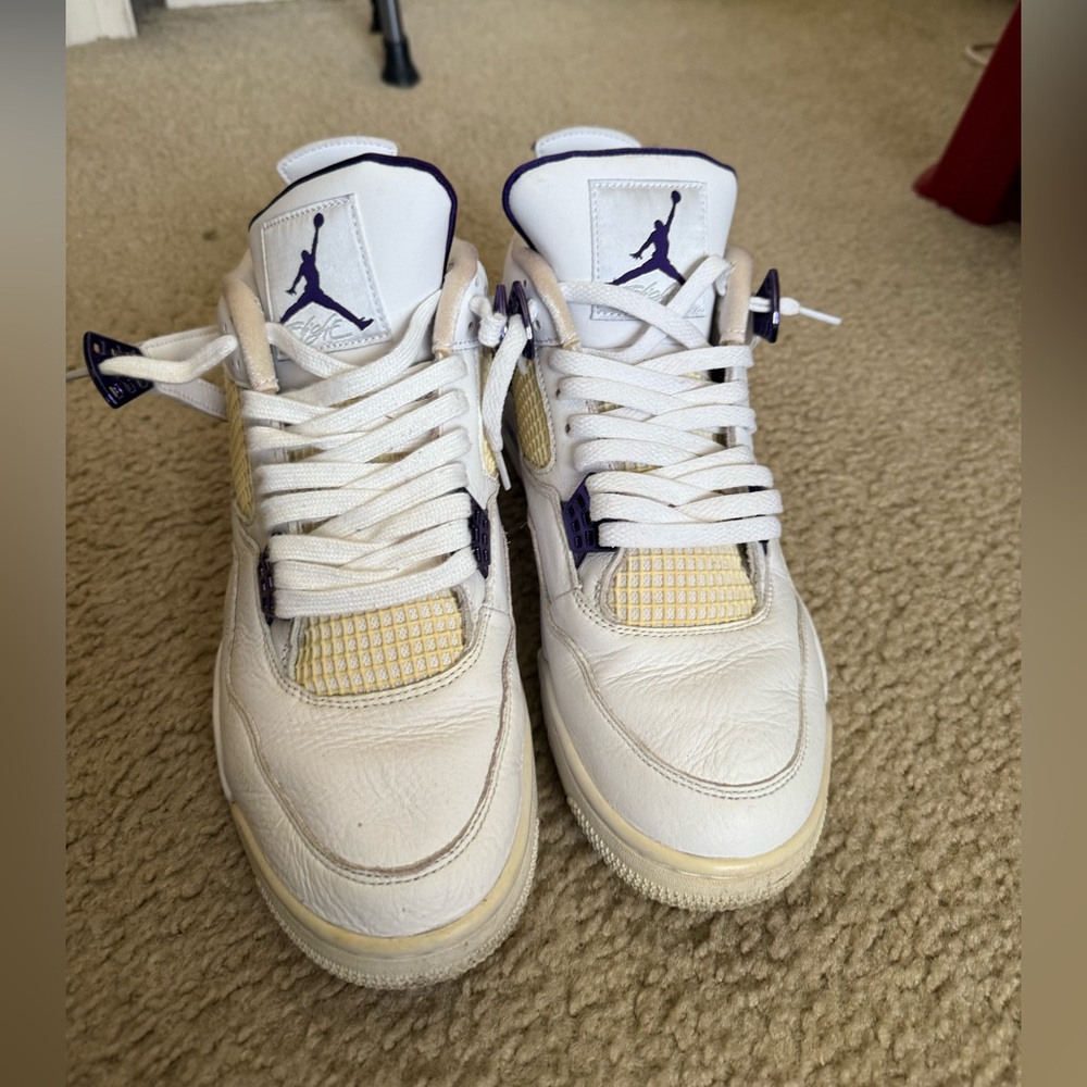 Good condition.  White and purple Jordans